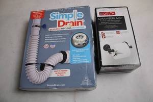 lot 80 image: Simple Drain Universal Trap Kit and Delta Chamberlain Toilet Paper Holder