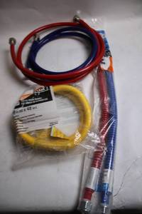 lot 108 image: Set of Gas Appliance Installation Kits with Color-Coded Hoses
