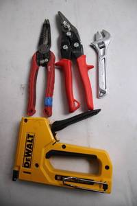 lot 122 image: Set of DeWalt Hand Tools Stapler, Pliers, Shears, and Wrench