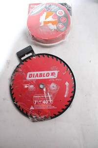 lot 205 image: Diablo 7-14 in. FinishPlywood Saw Blade and 5 in. StickFast Sander Discs Set