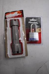 lot 209 image: Husky 1-18 in. x 1-14 in. Telescoping Basin Wrench and Master Lock Padlock Set