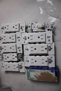 lot 216 image: Collection of 10 Leviton Duplex Outlets 15A Tamper Resistant