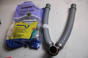 lot 271 image: Snappy Trap Universal Drain Kit for Bathroom Sinks
