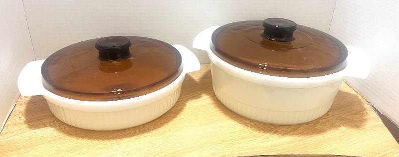 lot 54 image: 2 Fire King Casseroles with Lids 1 and 2 Quarts