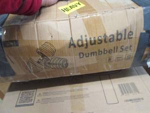lot 125 image: adjustable dumbell set...