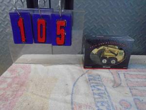 lot 105 image: Bobcat 50th anniversary 753 gold loader. 125 scale. As shown.