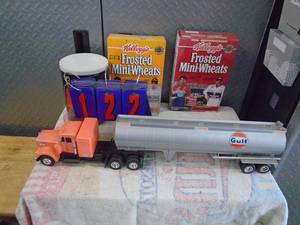 lot 122 image: Misc Gulf semi truck & Dale Earnhardt items. As shown.
