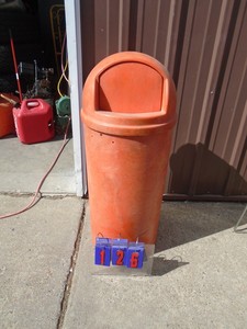 lot 126 image: Industrial resin garbage can. Heavy unit. Wont blow away. As shown.