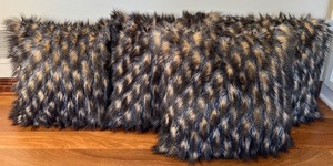 lot 23 image: Set of 4 Faux Fur Throw Pillows by Safavieh