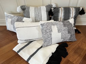lot 24 image: Set of Decorative Black and White Throw Pillows and Blanket