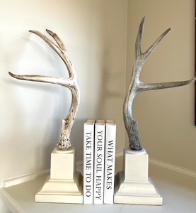 lot 40 image: Set of 3 White Decorative Books with Resin Antler Bookends