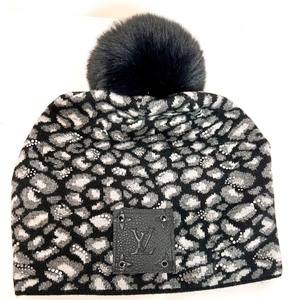 lot 75 image: Louis Vuitton Leopard Print Knit Beanie with Pom-Pom