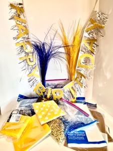 lot 143 image: Colorful Birthday Party Supply Set with Napkins, Decorations, and Cutlery