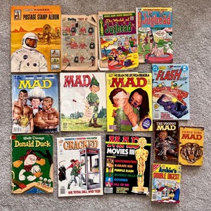 lot 153 image: Vintage Collection of Comics & Rare Stamp Album