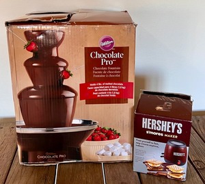 lot 161 image: Wilton Chocolate Pro Fountain and Hersheys Smores Maker Set