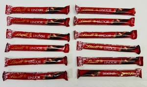 lot 83 image: SSS. 12x Lindt Lindor Milk Chocolate Truffle Bars