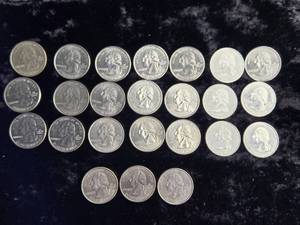 lot 52 image: 24 Different State Quarters & Book for 1999-2001