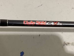 lot 583 image: Ugly Stik 66 GX2 Spinning Fishing Rod and Reel Spinning Combo Medium