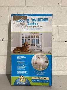 lot 600 image: Carlson Extra Wide Walk-Through Pet Gate with Small Pet Door, Fits Openings 29-38.5 Wide