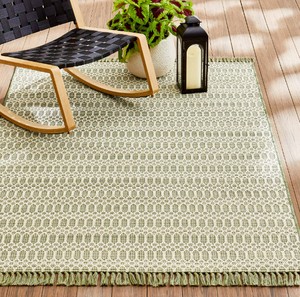 lot 473 image: Better Homes & Gardens 5x7 Green Tassel Outdoor Rug