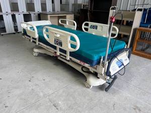 lot 315 image: Stryker Hospital Bed Bad Caster