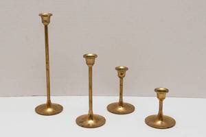 lot 16 image: Set of Four Vintage Brass Candlesticks