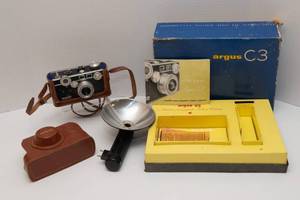 lot 34 image: Argus C3 35mm Camera with Case and Flash  Vintage