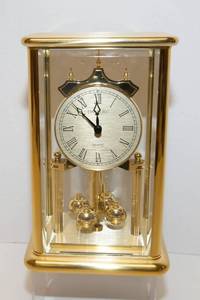 lot 49 image: Danbury Quartz Gold-Toned Clock