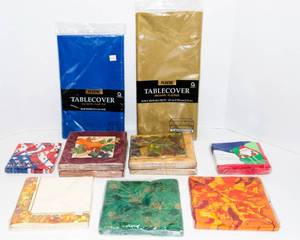 lot 152 image: 9 Packs of Disposable Napkins and Two Plastic Tablecloths
