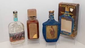 lot 214 image: Three Collectors BottlesDecantors