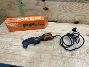 lot 74 image: RIDGID 4 Amp Corded Oscillating Multi-Tool