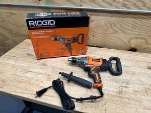 lot 92 image: RIDGID 9 Amp Corded 12 in. Spade Handle Mud Mixer
