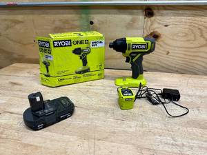 lot 123 image: RYOBI ONE 18V Cordless 14 in. Impact Driver Kit with 1.5 Ah Battery and Charger