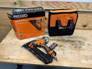 lot 133 image: RIDGID Pneumatic 15-Gauge 2-12 in. Angled Finish Nailer with CLEAN DRIVE Technology, and Tool Bag