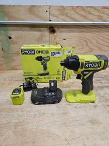 lot 36 image: RYOBI ONE 18V Cordless 14 in. Impact Driver Kit with 1.5 Ah Battery and Charger