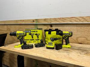 lot 213 image: RYOBI ONE 18V Cordless 2-Tool Combo Kit with DrillDriver, Impact Driver, (2) 1.5 Ah Batteries, and Charger