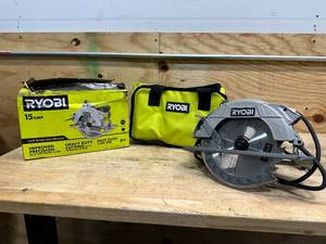 lot 216 image: RYOBI 15 Amp Corded 7-14 in. Circular Saw with EXACTLINE Laser Alignment System, 24T Carbide Tipped Blade, Edge Guide and Bag