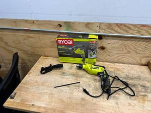 lot 218 image: RYOBI 6.2 Amp Corded 58 in. Variable Speed Hammer Drill
