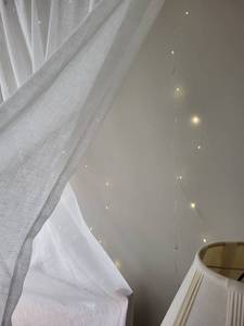 lot 32 image: Expandable Black Curtain Rod with Sheer White Curtains with LED Lights Perfect for wall decor or Wedding backdrop