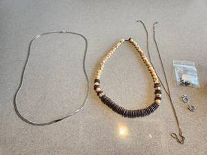lot 19 image: Stunning Jewelry Collection - Sterling Silver Earrings, Cultured Tahitian Pearls on 14K Gold Posts, and Necklaces
