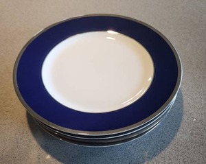 lot 21 image: Crate & Barrel Blue Rim Plates Set