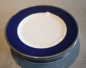 lot 24 image: Crate&Barrel Blue Rim Dinner Plates