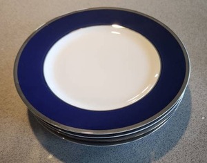 lot 25 image: Crate & Barrel Blue Rim Plates Set