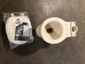 lot 17 image: American Standard Toilet Missing Pieces  Customer Returns See Pictures