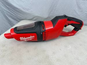 lot 24 image: Milwaukee M12 12-Volt Lithium-Ion Cordless Compact Vacuum