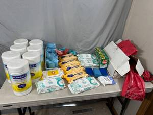 lot 99 image: Large Lot of Cleaning Wipes, Trash Bags, Cleaning Pads, and More