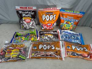 lot 127 image: Assorted Candy, Tootsie Pops, Fruit Chews, Tootsie Rolls, and More