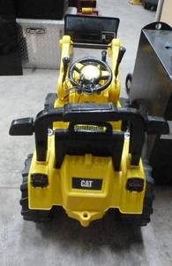 lot 12 image: Cute CAT loader - Kids electric ride on - Works as it should