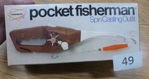 lot 49 image: New Vintage Original Pocket Fisherman with bag and manual