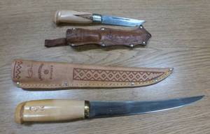 lot 53 image: Two nice J. MartTINI of Finland knives with leather sheath